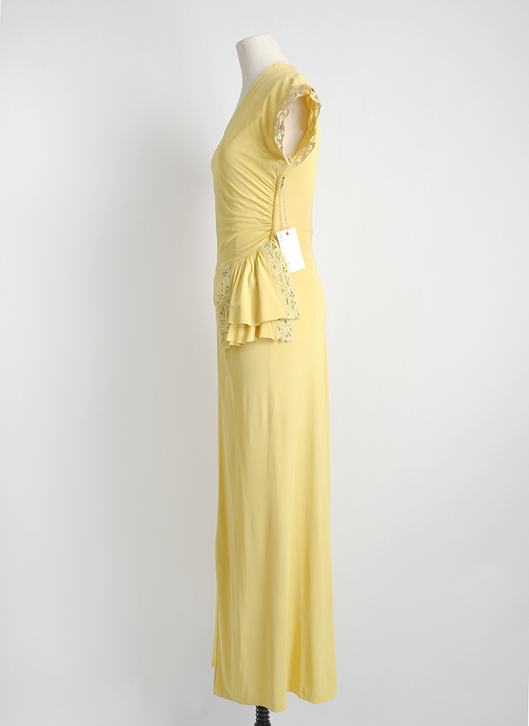 1940s yellow nylon jersey gown with side swag