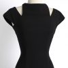 1950s Luis Estévez black crepe cocktail dress with cutouts