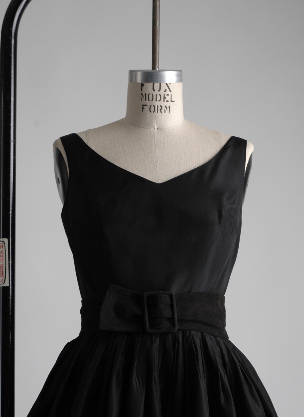 black ruffle cocktail dress