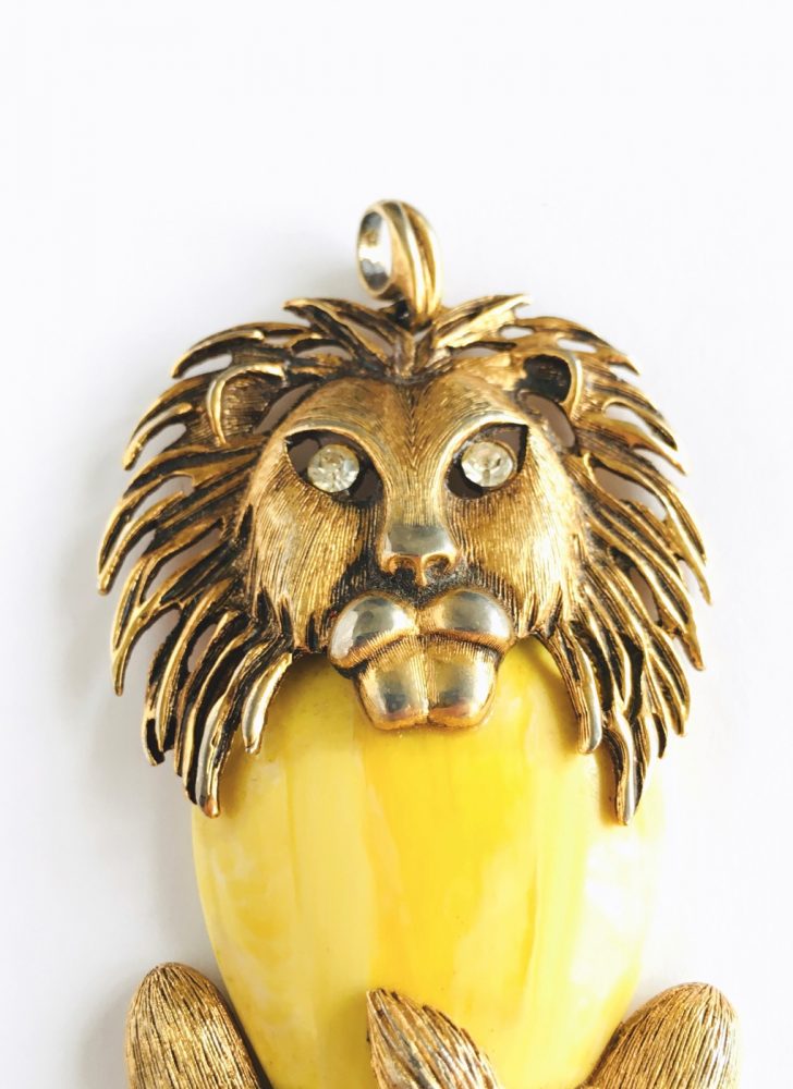 70s brass + yellow lucite lion pendant